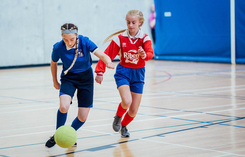 MIC League of Legends Soccer 2019 - Two players running with the ball. (Picture by Brian Arthur)